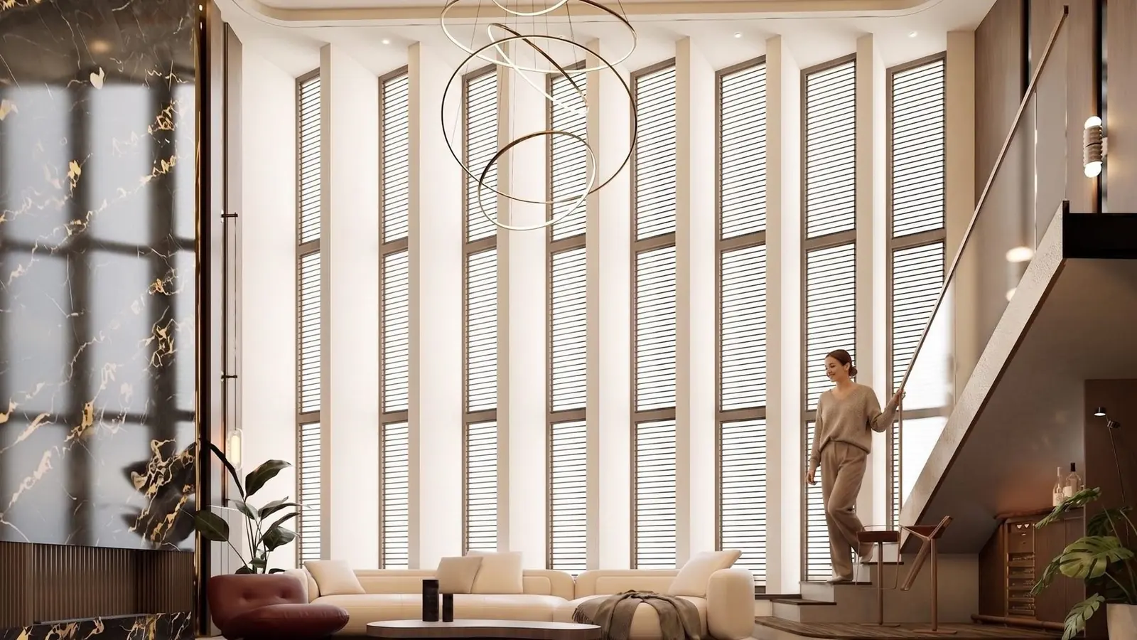 A double-height living room with louvred windows.